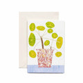 Greeting card featuring an illustrated potted plant with round green leaves in a patterned pot, with  cream envelope.